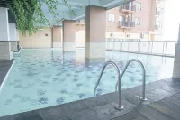 1BR near Gedebage Station at Tamansari Panoramic Apartment By Travelio
