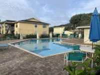 A + Location!  2 Bedroom/ 2 Bath Condo with pool/ stroll to beautiful beach