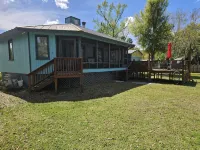 Cozy canal front house with its own boat ramp and dock. Amazing waterfront view. - 3-Star