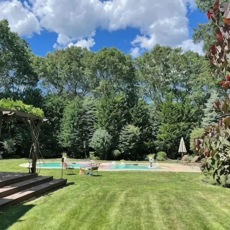 New Deck!  Private 1 Acre Family Friendly Home - Heated Pool, Home Office & Gym