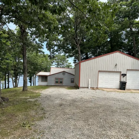 Updated 3 bedroom lakefront home offers privacy and comfort w dock on Grand Lake