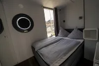 Houseboat Luv in Sonwik harbor with a view of Denmark