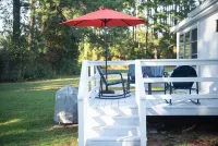 Mid-century modern meets classic cape on the coast. - 3-Star