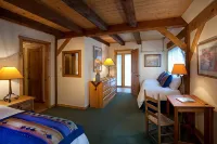 Cottam's Lodge by Alpine Village Suites Các khách sạn ở Red River