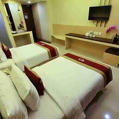 Grand Parama Hotel Rooms