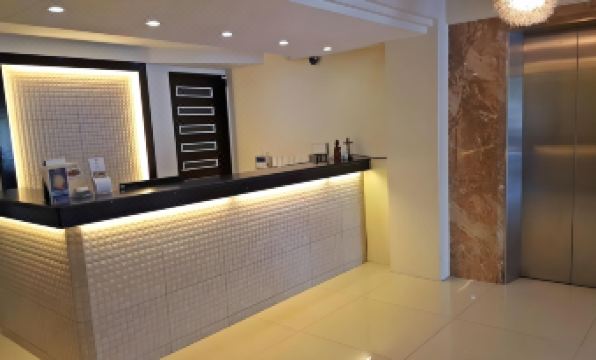 Manhattan Suites Inn - Housity