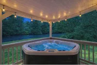 Cozy riverside cabin, hottub, fire-pit, fishing, tubing, relaxing