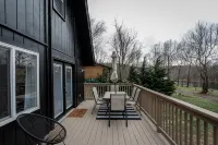 Modern Riverfront A-Frame Cabin w/ Hot Tub, Fire Pit, Kayaks, Canoe, & Arcade