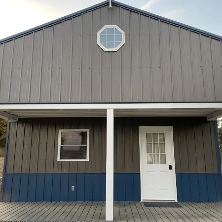 Blue Cabin in the woods close to Whiteman AF Base and Univ. of Central Missouri