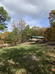 Cabin at Runestone Hideaway just steps from Heavener Runestone Park.