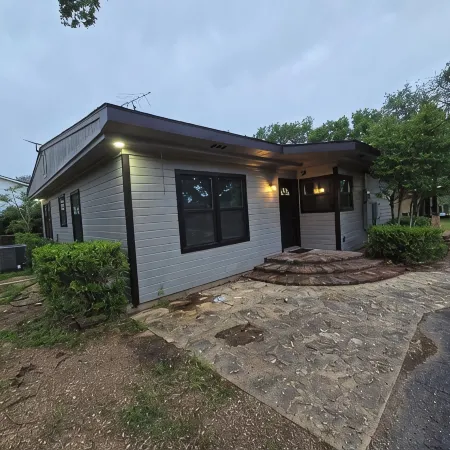Newly Renovated 1.5 Acre Lake Front Home with Game Room and Direct Lake Access.