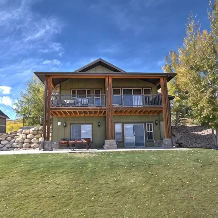 Private beach, pools/hot tub, winter sports, sleeps 20