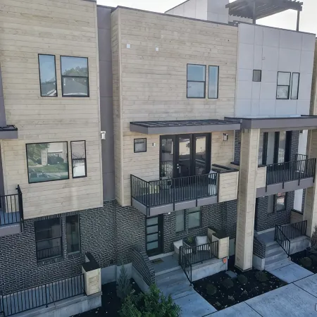 Downtown Modern 3-Bed Townhome with Bright, Upgraded Interiors & Books to read