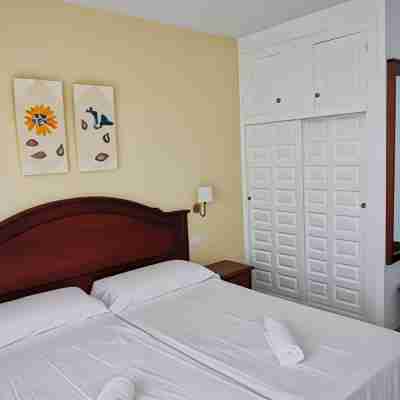 Apartamentos Playamaro Rooms