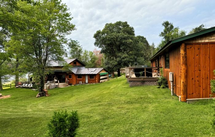 Welcome to Shangri-Lodge Your 2 cabin retreat on a family friendly lake.