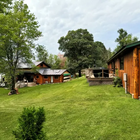 Welcome to Shangri-Lodge Your 2 cabin retreat on a family friendly lake.