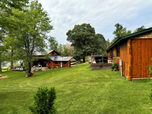 Welcome to Shangri-Lodge Your 2 cabin retreat on a family friendly lake.