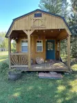 BEAUTIFUL lake front home with a private beach, dock and large yard