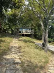 3-bedroom modern mid century cabin! Hot tub, fire pit and lake front