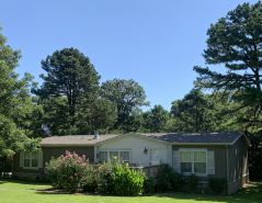Beautiful, Secluded Country Setting on the Bank of Rock Creek, East of Shawnee.