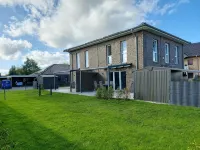 NEW! modern, high-quality, central apartment, with sauna, garden, wallbox in Burhave