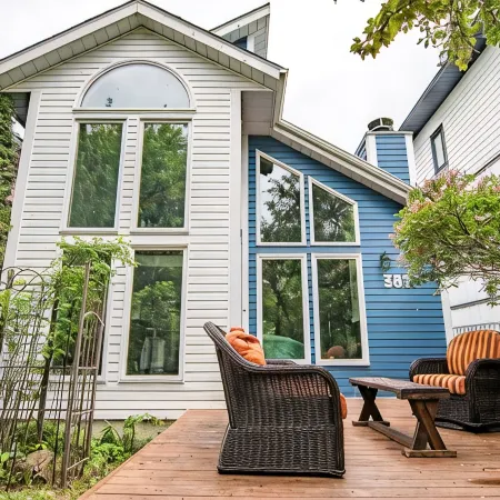 Sandy Beach Hideaway.  Cozy and Bright. Entire house steps from the Sandy Beach!