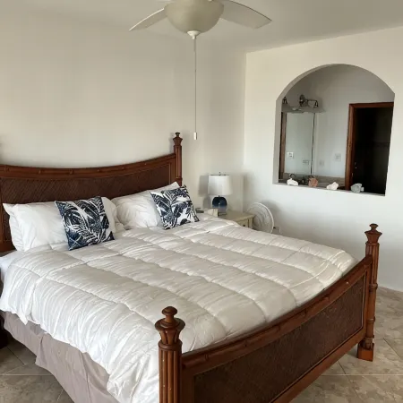 Cupecoy ocean view 2BR condo - pools/private beach