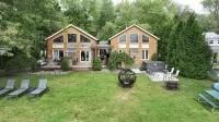 Stunning Luxury lakefront House on Oneida Lake with hottub, firepit and Gameroom - 4-Star