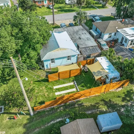 Renovated 1970’s retro camper on Bayou Grande in Pensacola with walking trail.
