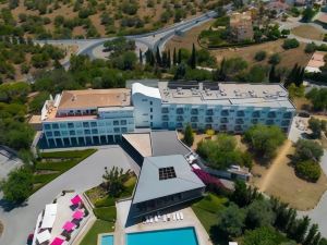 Ozadi Tavira Hotel