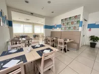 瑞米尼馬雷貝雷尼斯飯店 - 早餐
