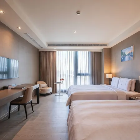 Jin Shi Hu Hotel Отели рядом с достопримечательностью «Станция метро World Games»