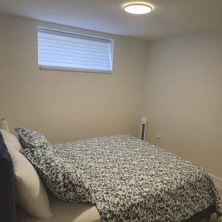 Fully furnished 1-bed basement apt in Moncton, fits 3 adults. Modern & cozy