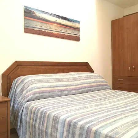 Terraced house in the shade of pine trees 500 meters from the beach.