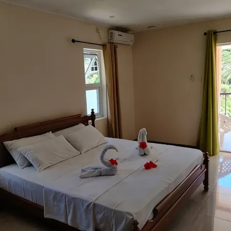 Peace in Paradise with mountain views and  5 minutes walk to the beach