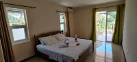 Peace in Paradise with mountain views and  5 minutes walk to the beach
