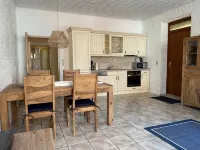 Vacation apartment "Seestern" with large garden in the heart of Pilsum - Homestays