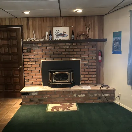 Privacy! One  & 1/2 acre with wrap around deck. Backs the National Forest.