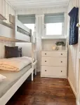 Cozy vacation home in southern Norway (Tromøy, Arendal) with a boat and a pier.