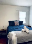 2-Bedroom Downtown Suite | King Bed - Homestays