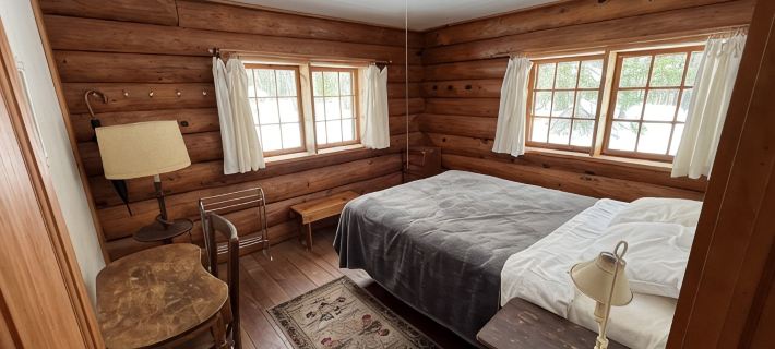 New!  Sleeps 15 Level lawn to lake.  Sandy beach.  Two docks. Great fishing. Hotels in Vilas County
