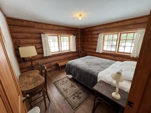New!  Sleeps 15 Level lawn to lake.  Sandy beach.  Two docks. Great fishing.