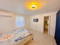 Charming 3-bedroom Beach House with AC and WiFi near Arecibo's best beaches.