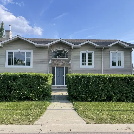 Spacious bungalow with large backyard and garage close to West Ed Mall