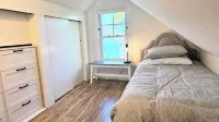 Tranquil Modern Upstairs Apt. Walk to Restaurants & Beach! Off-Street Parking, - Wifi