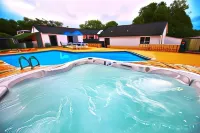 Peach Tree Inn & Suites