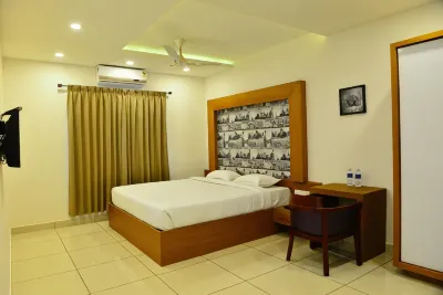 Aura Residency Hotels near Rajahamsam Holidays House Boat
