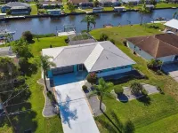 'Fully Updated and New' Waterfront Pool home with boat lift in paradise Hotels near Publix Super Market at Quesada Commons