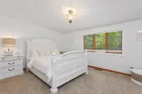 Cozy cottage surrounded by trees and sounds of nature with new hot tub.