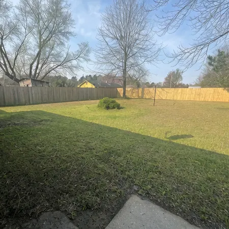 Spacious 4-bedroom house in Columbus with privacy fence situated in the county!